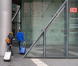 Travellers with luggage at the Deutsche Bahn main station, Potsdamer Platz