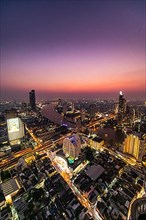 Nightshot from Bangkok and the Chao Phraya River with the dome of Lebua tower, Bangkok