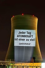 Every day of nuclear power is one too many: Greenpeace projection at the Philippsburg nuclear power plant. Philippsburg, Baden-Wuerttemberg