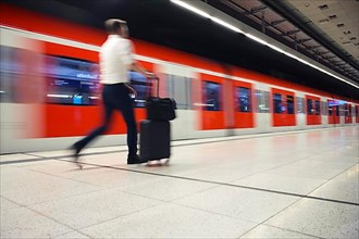 Arriving S-Bahn, traveller