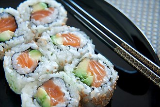 Salmon avocado sushi roll,