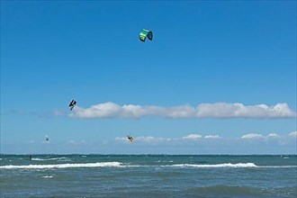 Kitesurfer jumps off Graswarder peninsula, Heiligenhafen