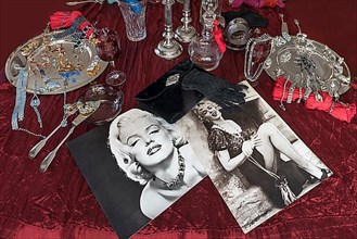 Old Marilyn Monroe photos decorated with accessories and rhinestone jewellery on silver plates, Bavaria