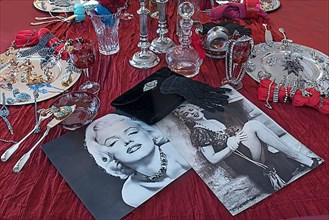 Old Marilyn Monroe photos decorated with accessories and rhinestone jewellery on silver plates, Bavaria