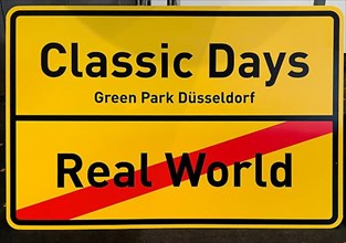 Fictitious traffic sign Place-name sign for classic car festival Classic Days 2022 on Messe Duesseldorf exhibition grounds, Duesseldorf