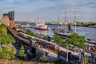 Hamburg elevated railway with museum ships and Elbe Philharmonic Hall on the Elbe in the Port of Hamburg, Hamburg