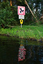 Signs prohibiting motoring and nature reserve on a stretch of water in the middle Havel, Brandenburg