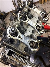 Engine block of air-cooled engine of historic classic sports car classic car Porsche 911 is dismantled for restoration complete overhaul, Germany