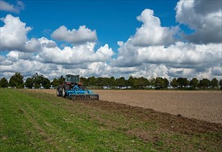 Agriculture, tractor ploughing the field