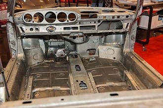 Gutted interior of stripped body without paint for restoration Reconstruction of historic classic sports car Classic Car Porsche 911, Messe Techno Classica