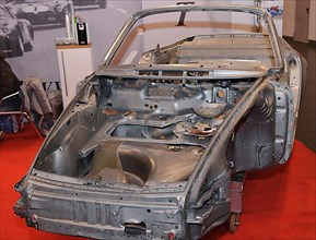 Stripped bodywork without paint for restoration Reconstruction of historic classic sports car Classic Car Porsche 911, Messe Techno Classica