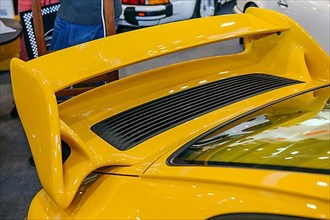 Rear wing for downforce of modern sports car racing car Porsche 911 GT2 Turbo, Techno Classica trade fair