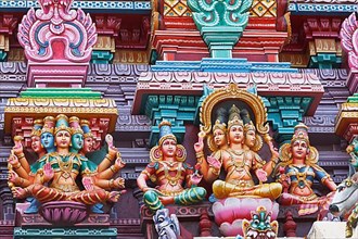 Brahma and Vishnu images. Sculptures on Hindu temple gopura