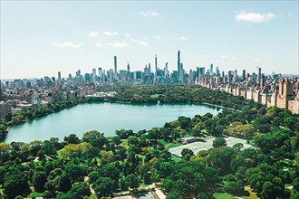 Circa September 2019: Spectacular View over Central Park in Manhattan with beautiful Rich Green Trees and Skyline of New York City HQ