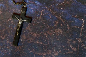 Crucifix on a dark background