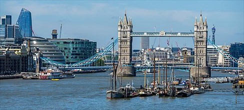 Ower Bridge City Hall and Ships on the Thames London England