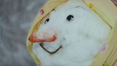 Happy funny snowman-woman