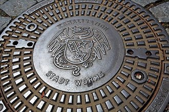 Manhole cover with coat of arms of Worms. Worms