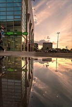 Sunset in reflection of a puddle in the city centre of Szczecin