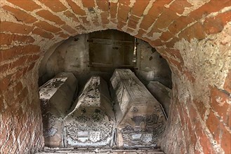 Crypt with coffins of the patronage families von Buelow and von Plessen under the tower of the Gothic village church