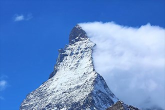The Matterhorn with an impressive cloud plume. Zermatt
