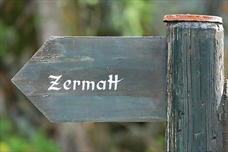 Wooden signpost to Zermatt. Zermatt