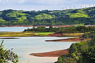 West shore of Lake Arenal with wind turbines
