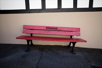 Red Carpool bench