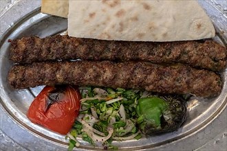 Serving of traditional urfa kebab in Gaziantep