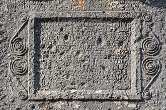 Inscription on twin Rock Tomb in Sidyma Ancient City