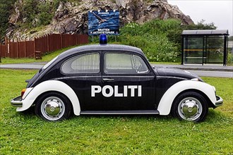 Black and white police patrol car VW Beetle