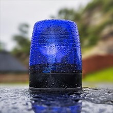 Blue light on a car roof