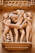 Famous erotic stone carving sculptures decorating Devi Jagadamba Temple
