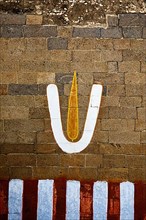 Vishnu symbol on wall of Hindu temple. India