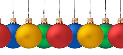 Row pf hanging Christmas baubles isolated on white background