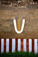 Vishnu symbol on wall of Hindu temple. India