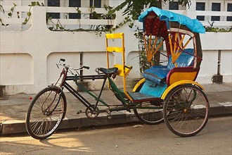 Empty bicycle rickshaw in street. Pondicherry
