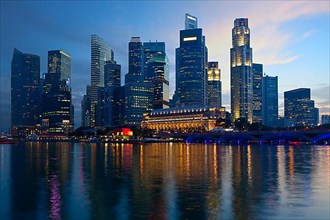 Singapore skyline and Marina Bay in evening