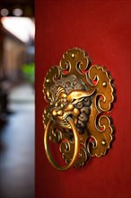 Doorknob of the Temple shaped as a jiaotu