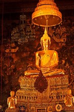 Sitting Buddha Gold Statue in Buddhist Temple. Wat Pho