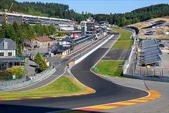 View from 40 metres high hilltop above the steep Raidillon driveway on the dangerous Eau Rouge bend of the Spa Francorchamps racetrack