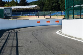 View from racer's perspective of start of turn from Pit Lane Exit of FIA Formula 1 Circuit