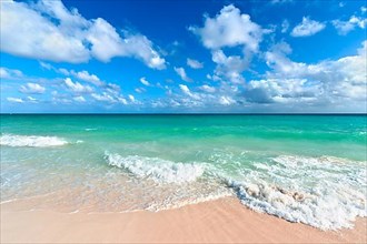 Beautiful beach and waves of Caribean Sea. Riviera Maya