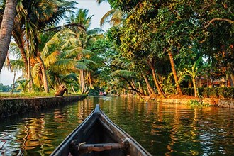 Kerala backwaters tourism travel in canoe. Kerala