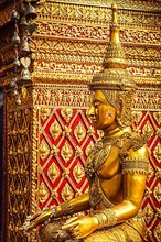 Gold sitting Buddha statue in Wat Phra That Doi Suthep