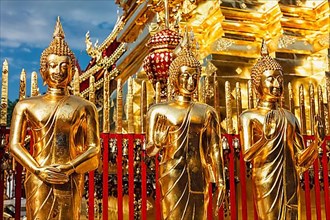 Gold Buddha statues in Wat Phra That Doi Suthep