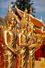 Gold Buddha statues in Wat Phra That Doi Suthep