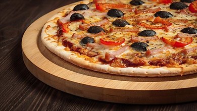 Panoramic image of ham pizza with