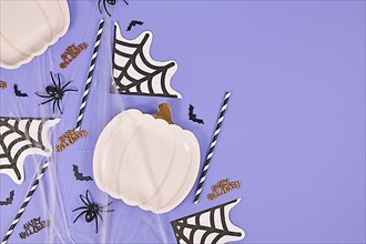 Halloween party flat lay with pumpkin shaped plate