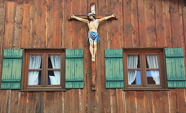 Crucifix on a wooden wall